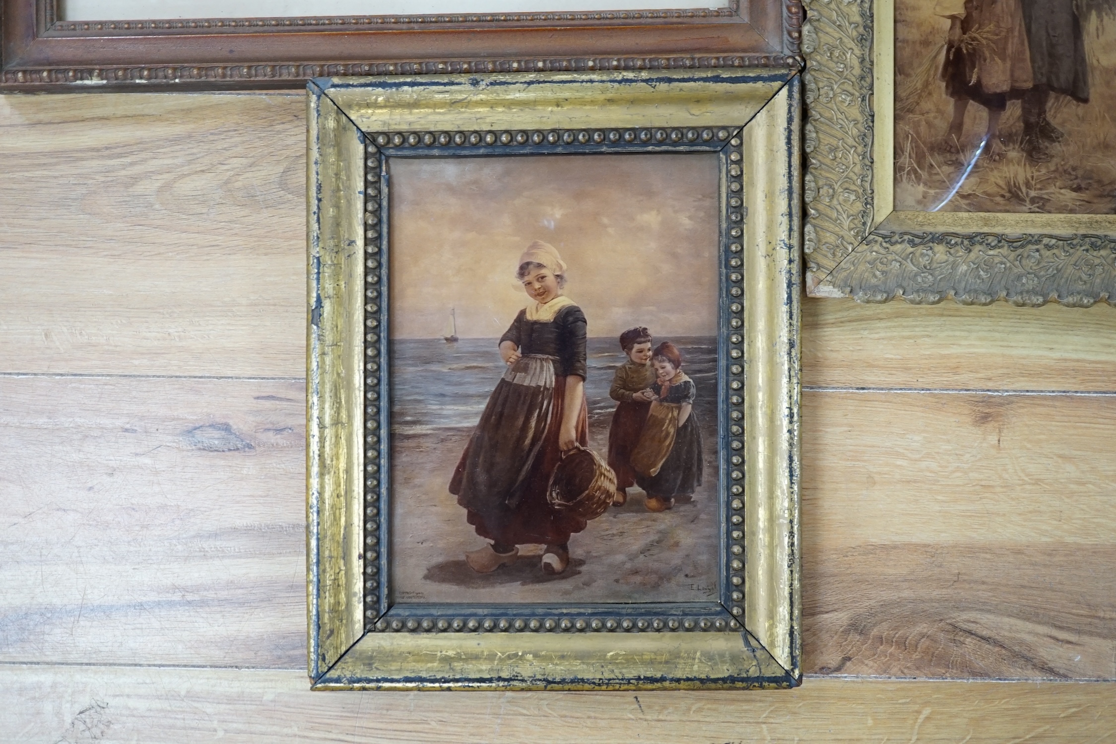 Two Victorian crystoleums including after Edmond Louyot (French, 1861-1920), Children on a beach, copyright 1906 by Franz Hanfstaengl, and a 19th century watercolour of a pier by W.A. Earp, 25 x 16cm. Condition - fair